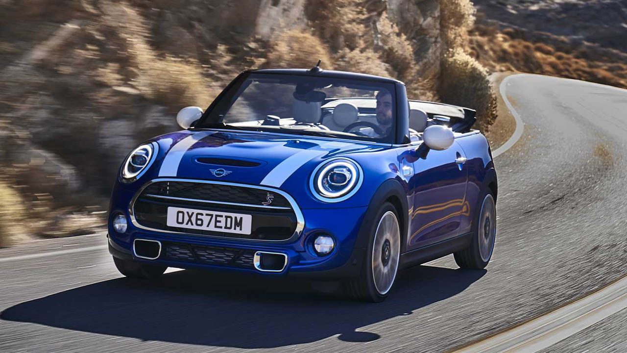 blue mini convertible, driving