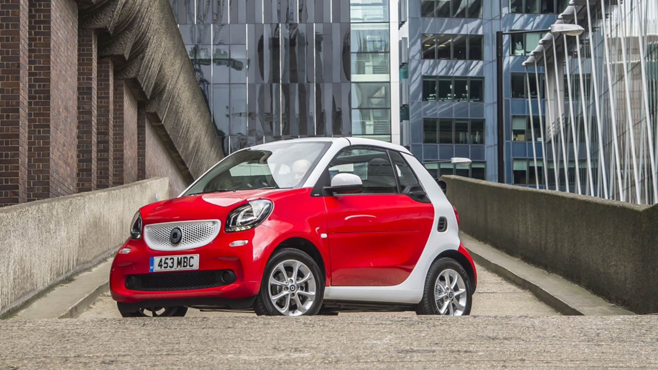 red smart fortwo cabrio, parked