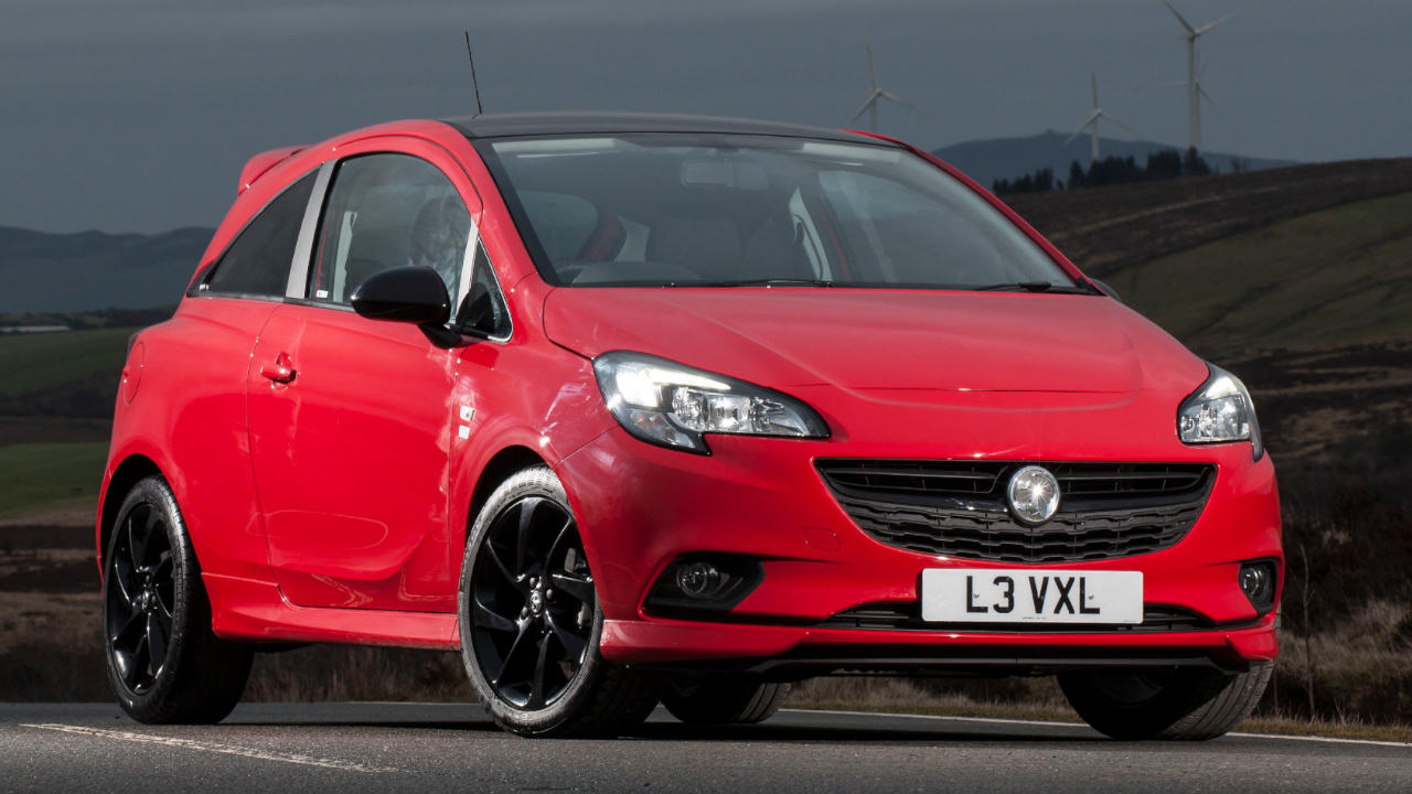 Red Vauxhall Corsa, parked