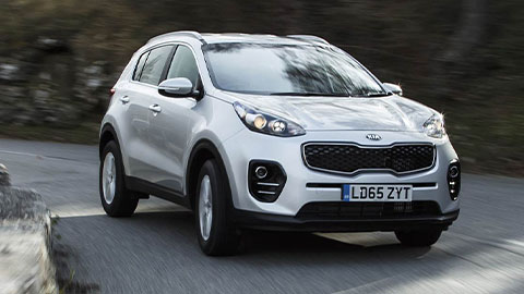 Silver Kia Sportage, cornering