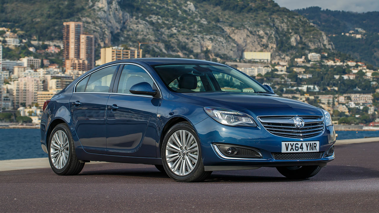 Blue Vauxhall Insignia, parked
