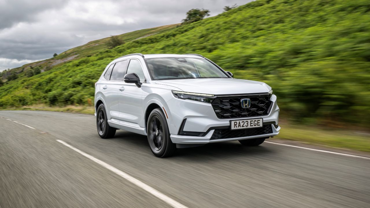 White Honda CR-V driving front