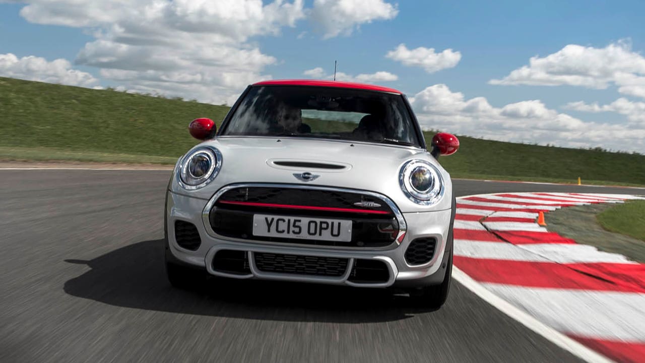 White MINI Hatch JCW Exterior Front Driving