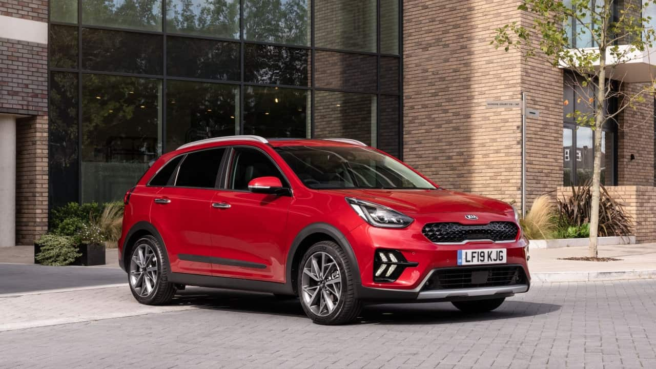 Red Kia Niro, parked