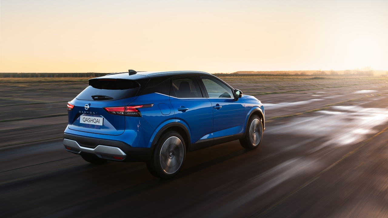 Blue Nissan Qashqai rear right driving