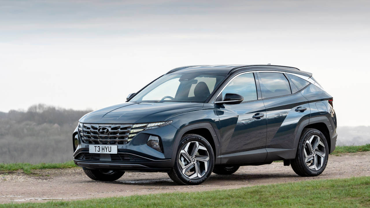 Blue Hyundai Tucson hybrid