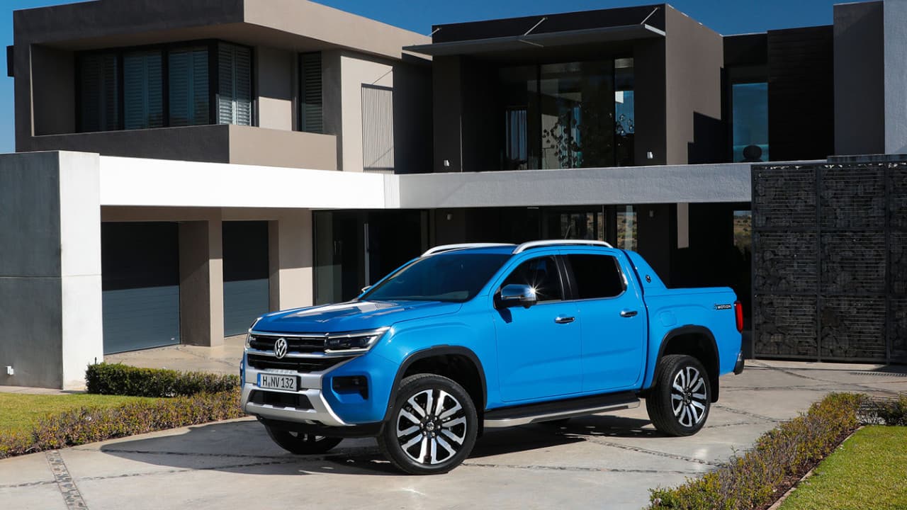 VW Amarok Blue Parked Outside House
