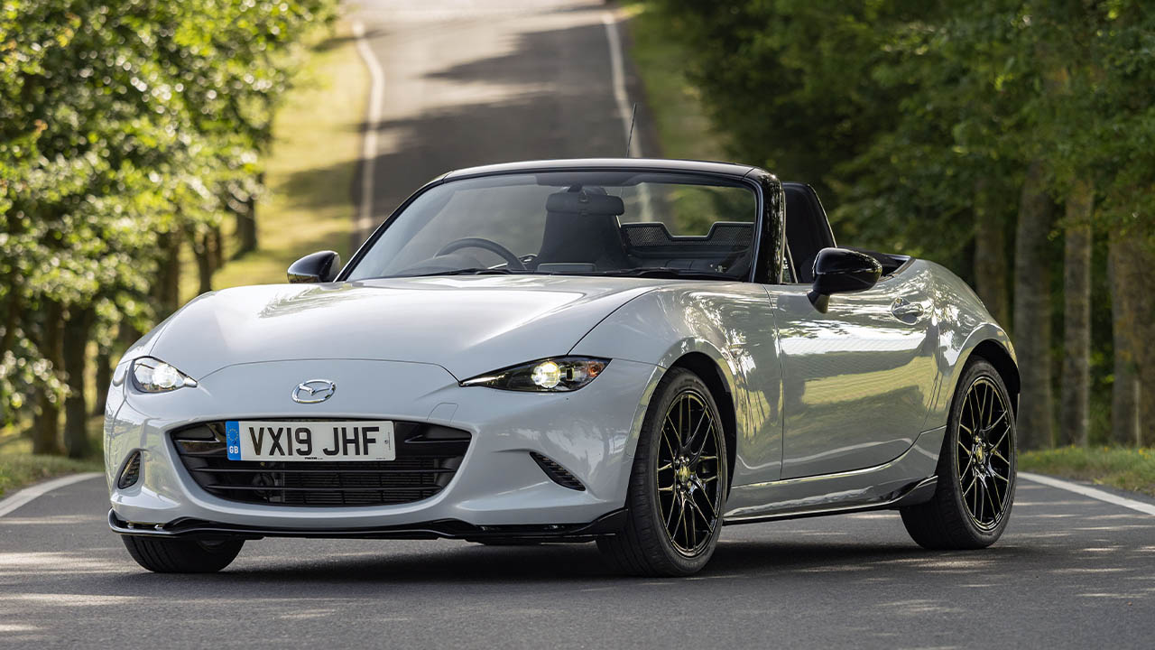 White Mazda MX-5, parked