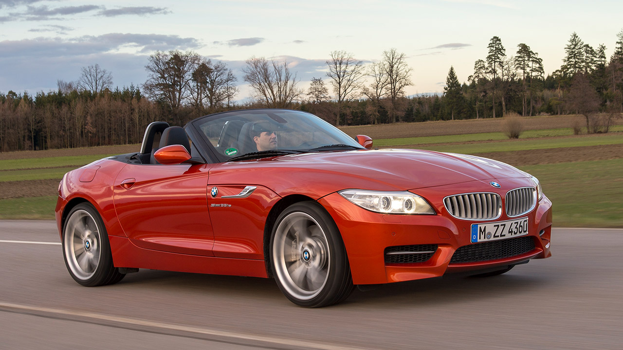 Orange BMW Z4, driving