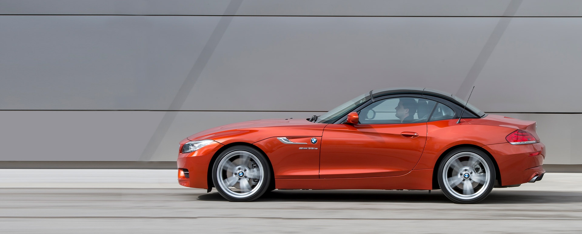 Orange BMW Z4, side profile