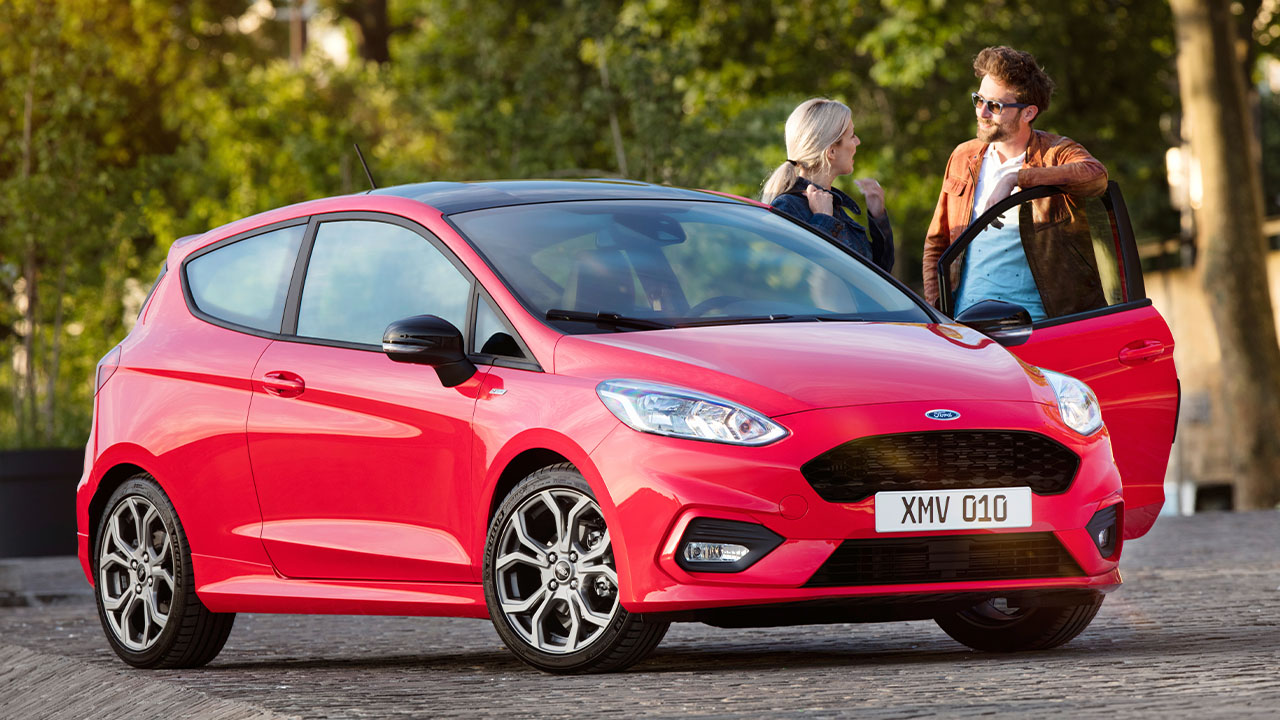 Red Ford Fiesta, parked