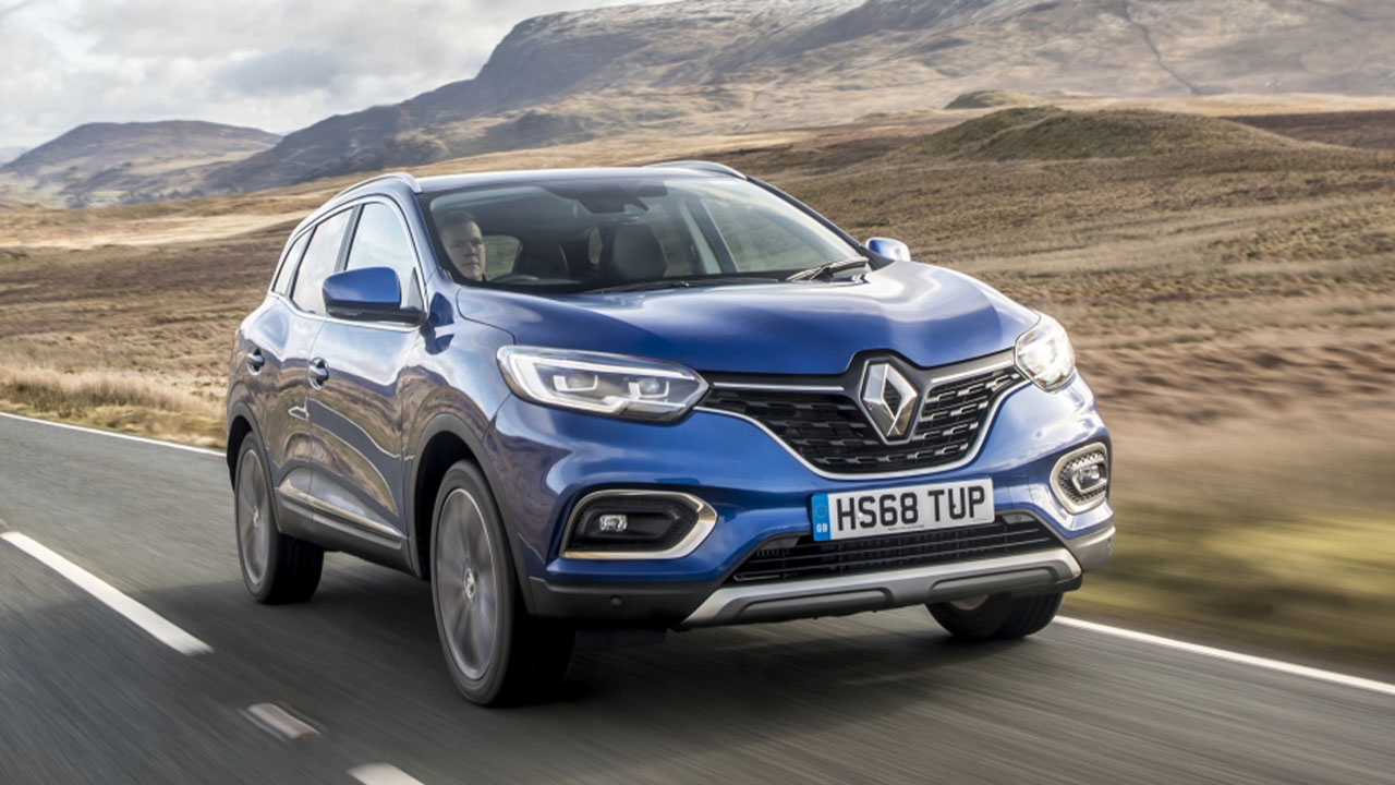 Blue Renault Kadjar, driving