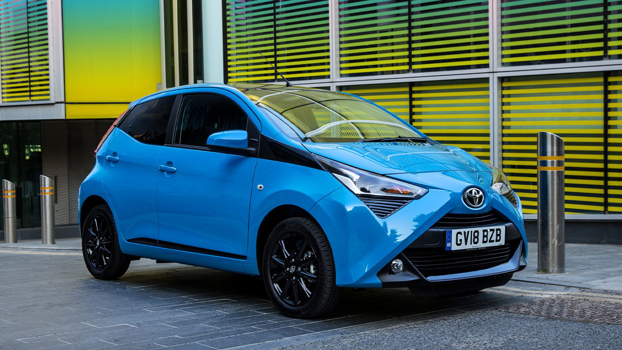 Light Blue Toyota AYGO, parked