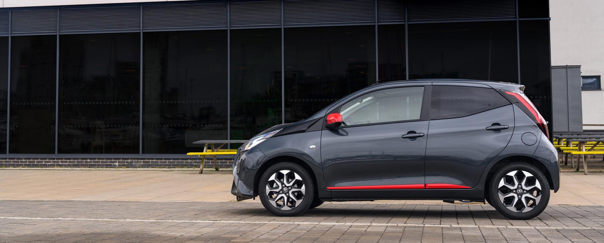 Grey Toyota AYGO, parked, side profile