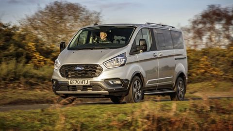 Silver Ford Transit in the countryside