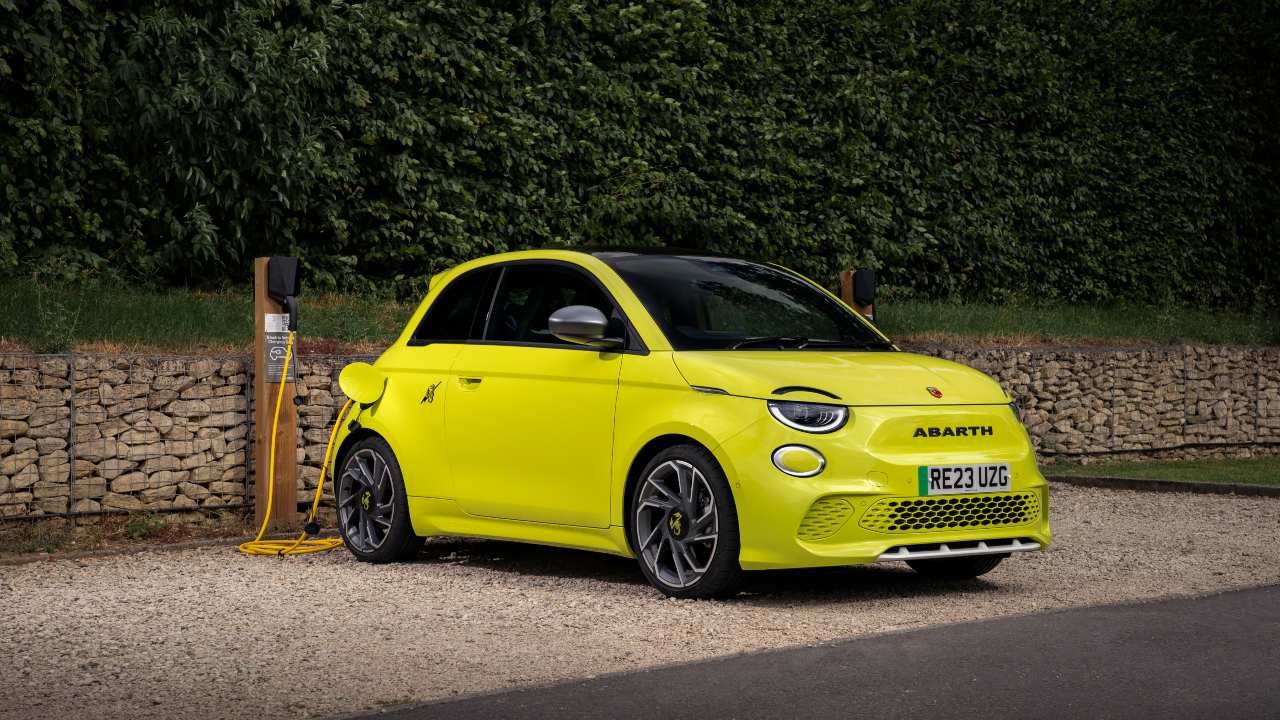 Abarth 500E charging bright yellow