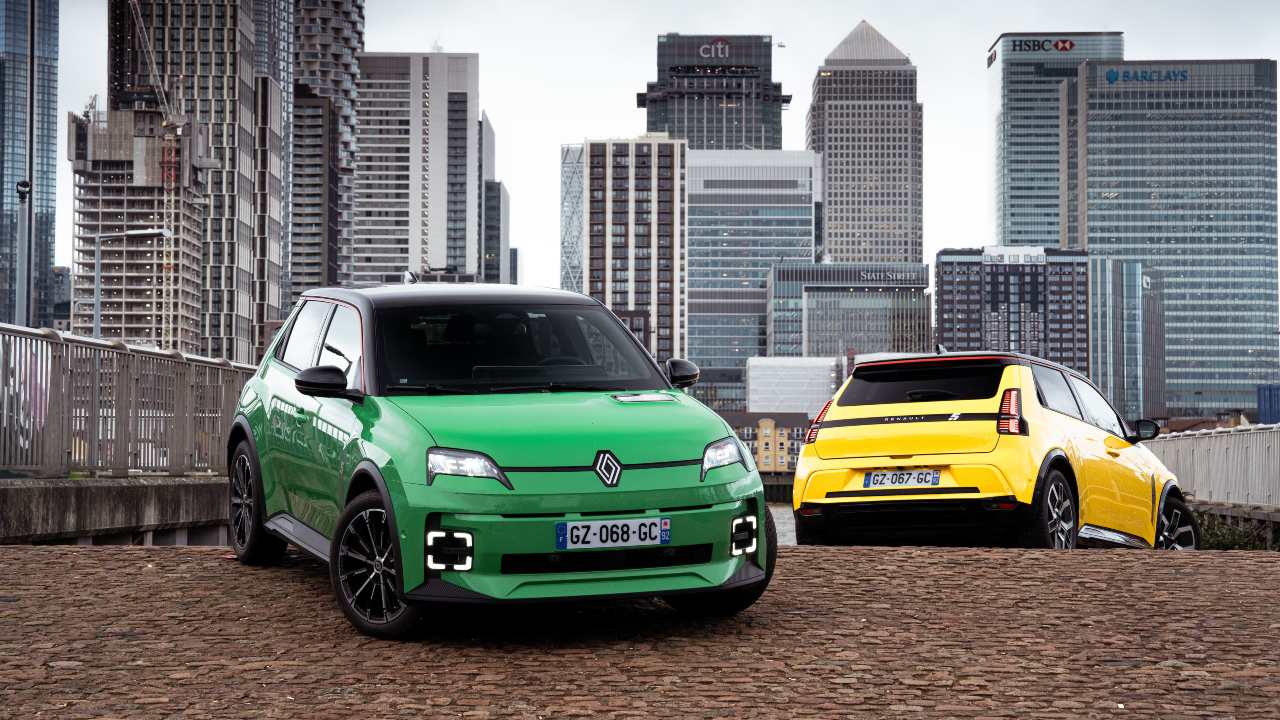 Pair of Renault 5's near city skyline