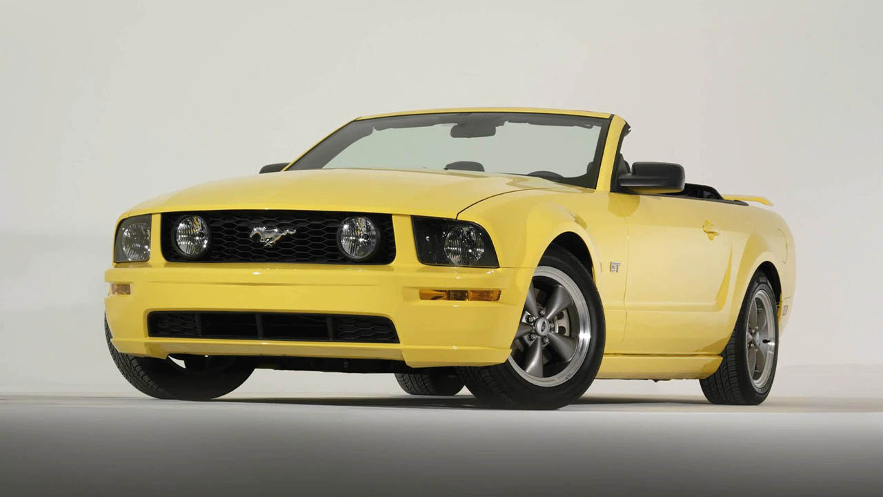 yellow ford mustang convertible