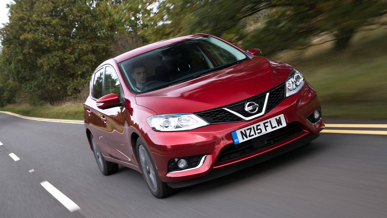 Red Nissan Pulsar, driving shot