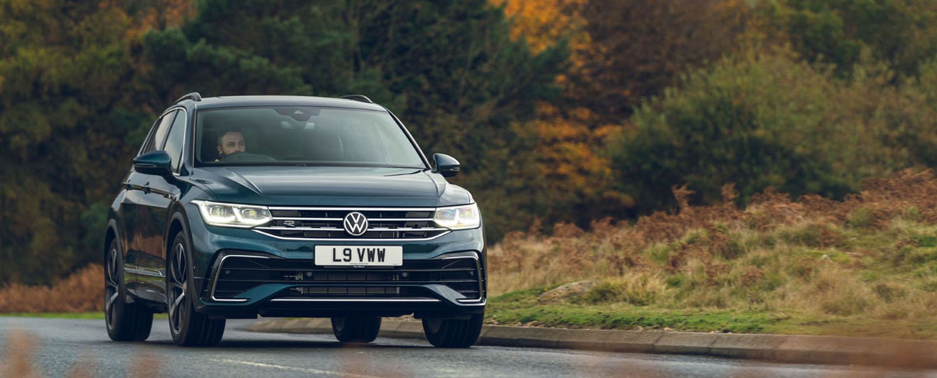 Volkswagen Tiguan, driving shot, countryside background