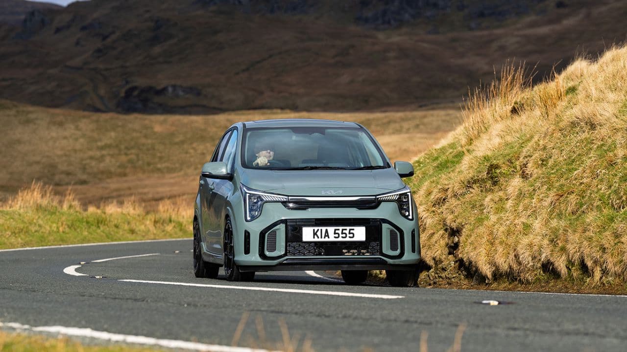 Kia Picanto driving in the countryside