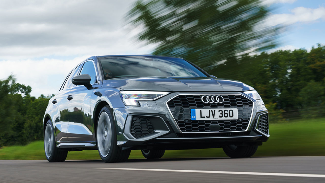 Grey Audi A3 Sportback, driving down country road