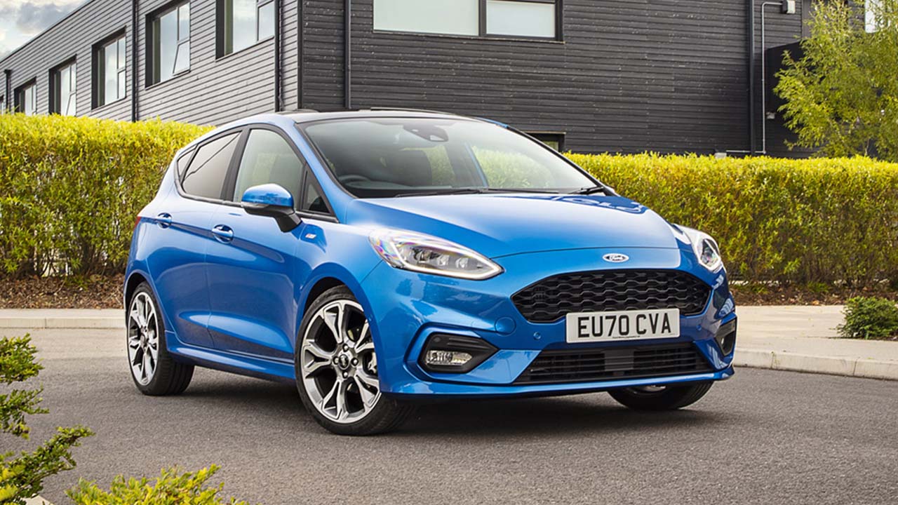 Blue Ford Fiesta, parked in business park