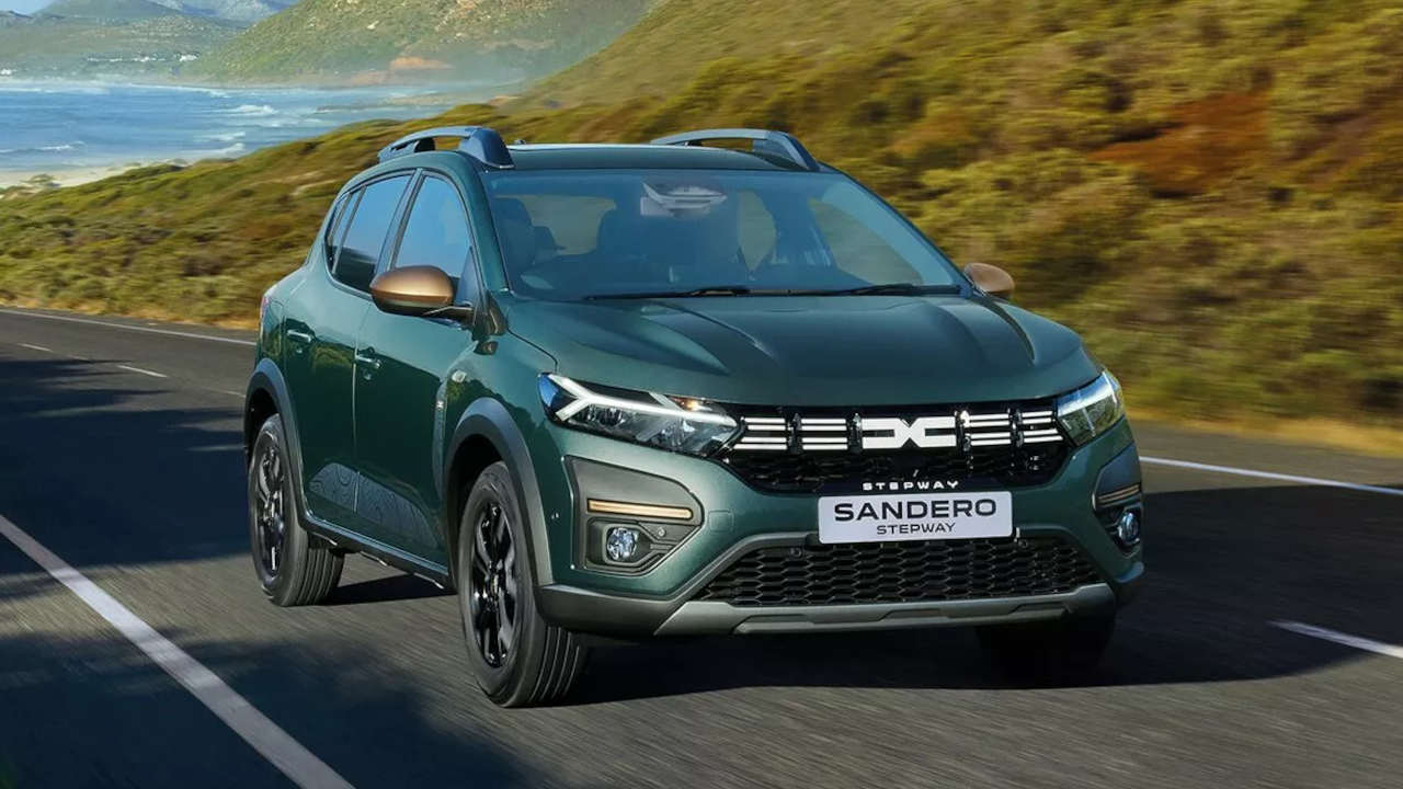 Green Dacia Sandero Stepway Driving On Road