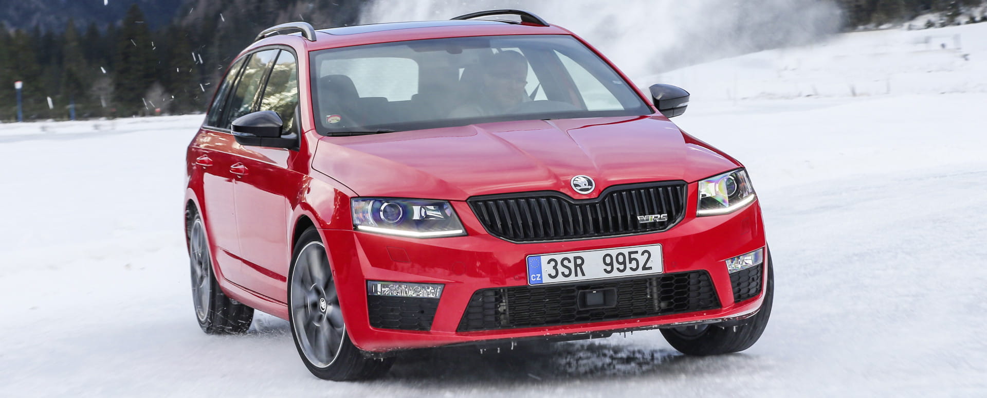 Red Skoda Octavia Driving Winter