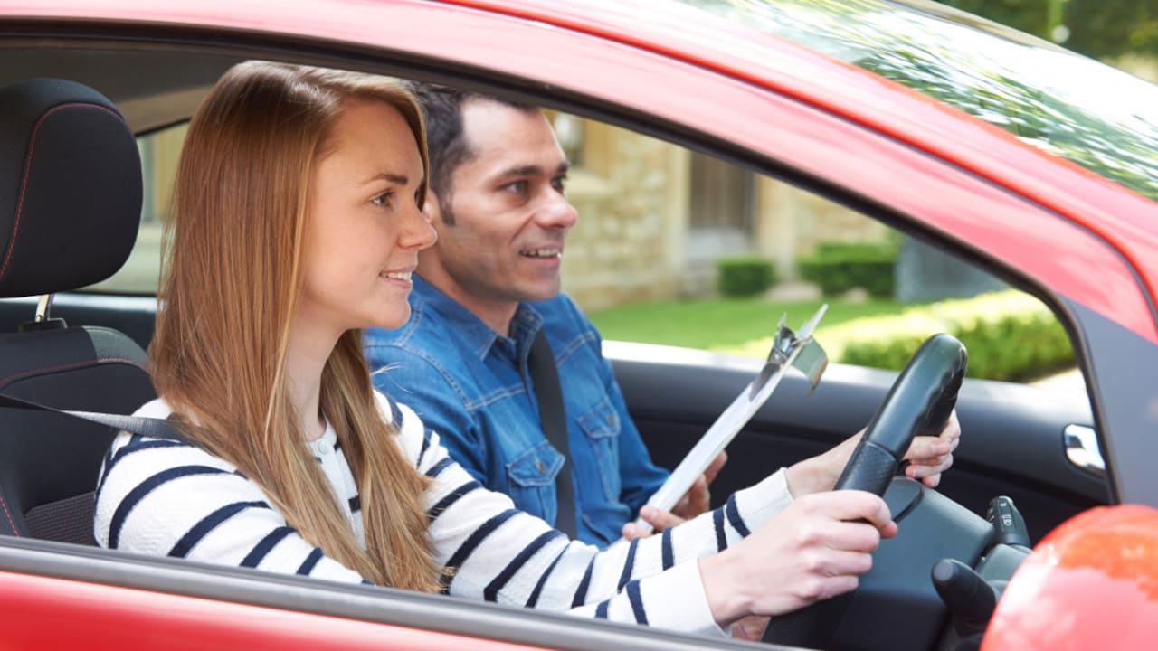 Young Female Driving Lesson