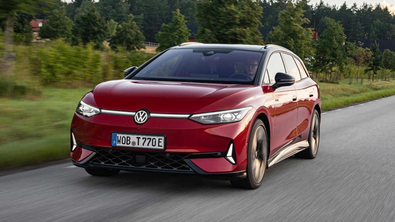 Red VW ID.7 Driving On Road