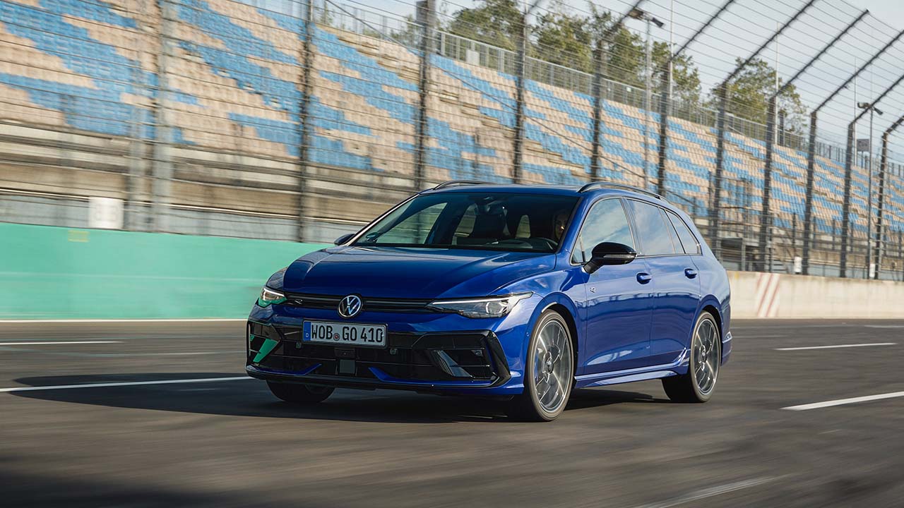 Blue Volkswagen Golf R Estate Exterior Front Driving on Race Track