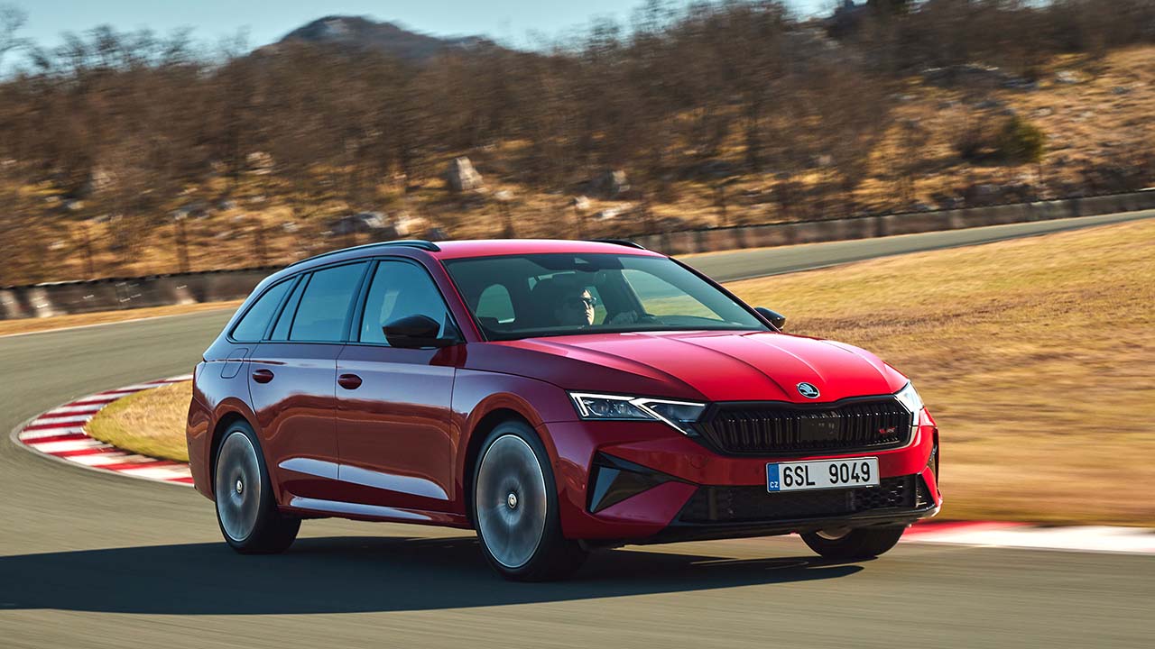 Red Skoda Octavia vRS Estate Exterior Front Driving on Race Track