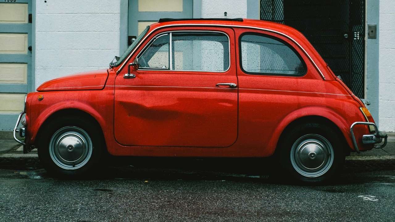 Red car with dented door
