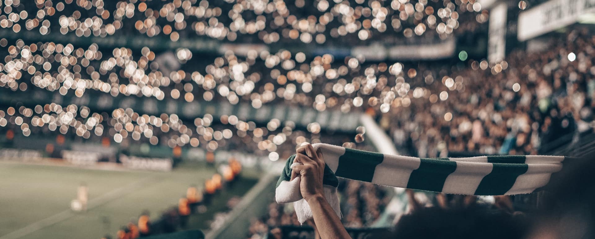 Fan Holding Green and White Scarf