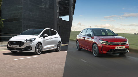 White Ford Fiesta and Red Vauxhall Corsa Side By Side