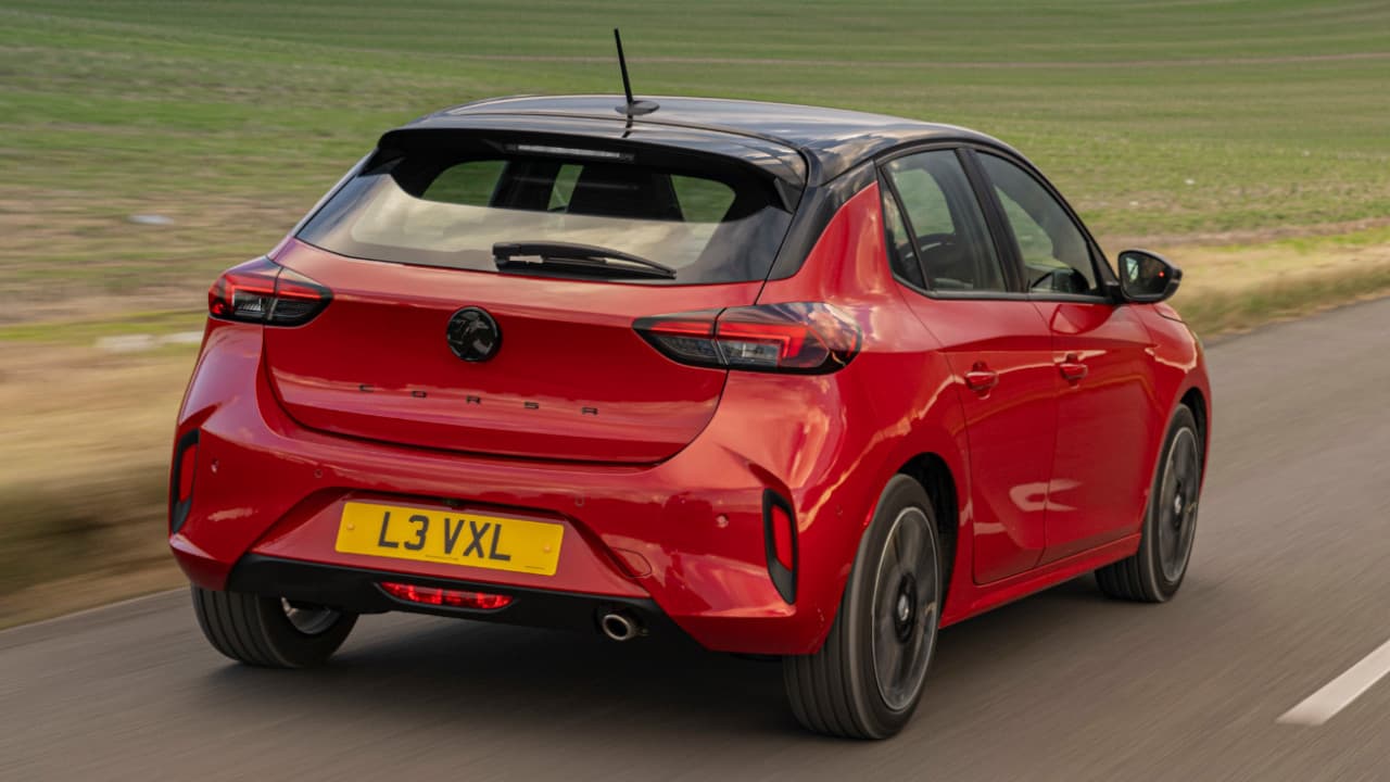 Vauxhall Corsa in Kiss Red Driving Rear