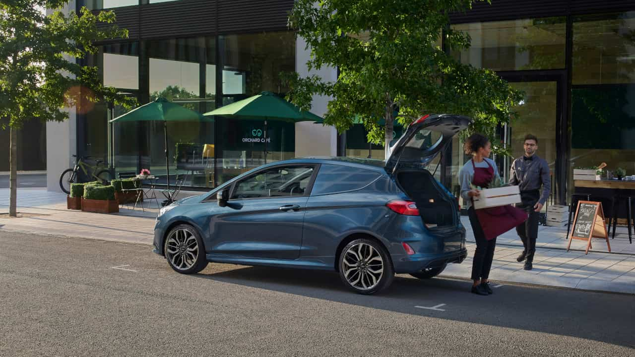 Blue Ford Fiesta Van Exterior Front