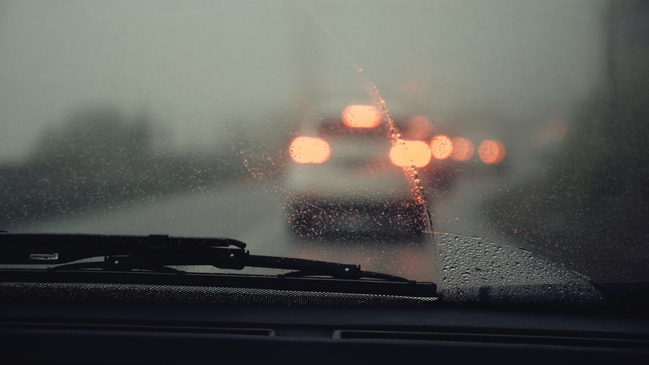 Traffic Ahead Through Blurred Rainy Windscreen