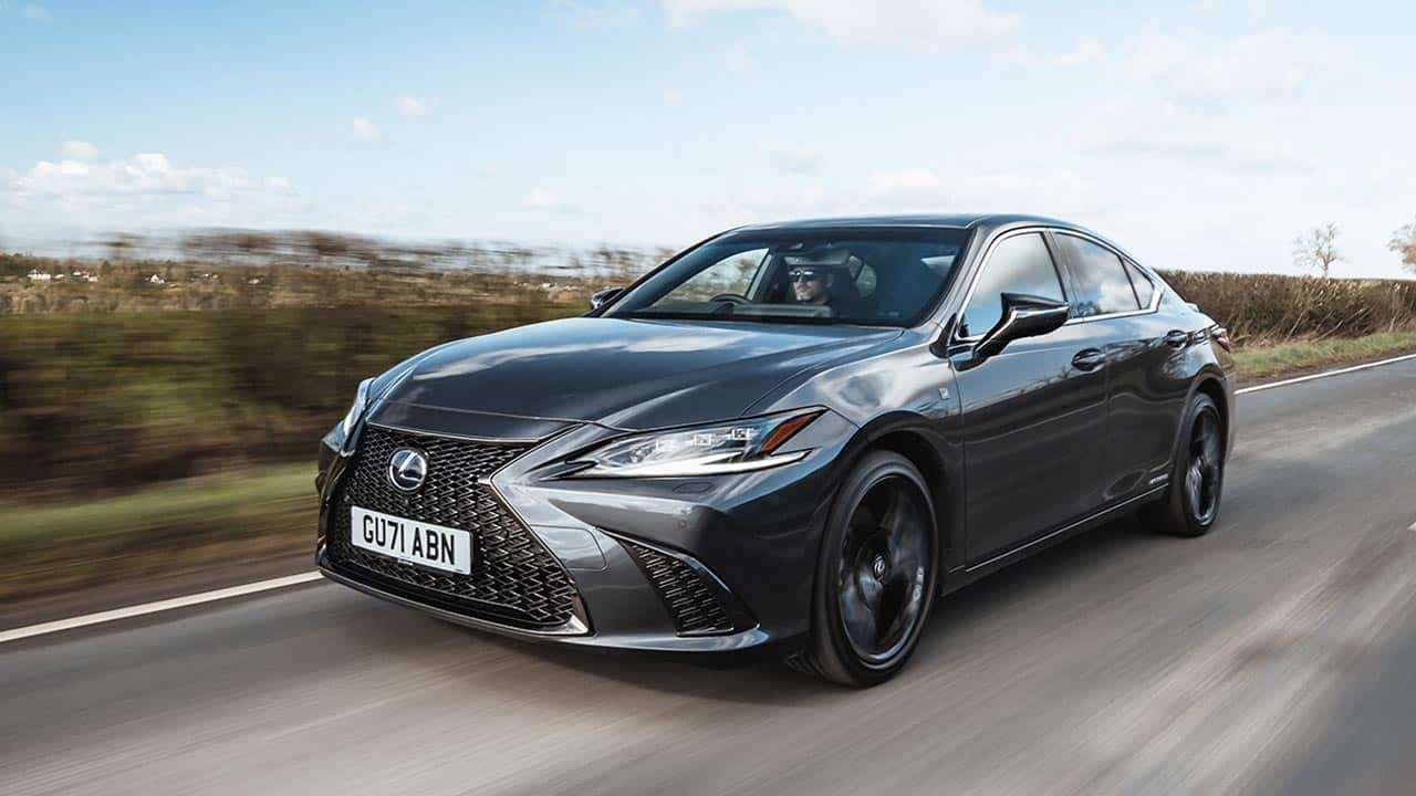 Grey Lexus ES 300, driving in the countryside, motion shot