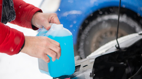 Man Holding Car Coolant