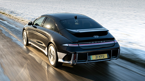 Rear Shot of Hyundai IONIQ 6 Driving On Icy Road