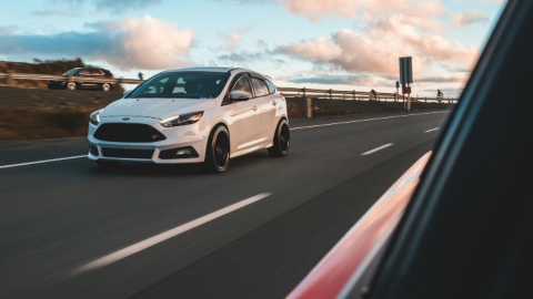White Ford Focus ST Overtaking Traffic on Motorway