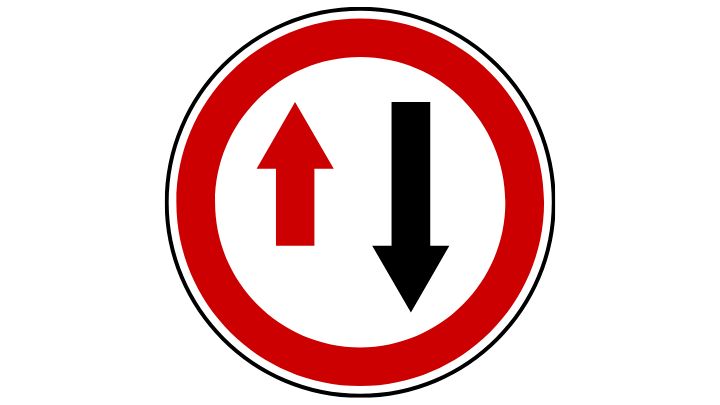 White circle with a thick red outline. Small red arrow pointing upwards on the left and large black arrow pointing down.