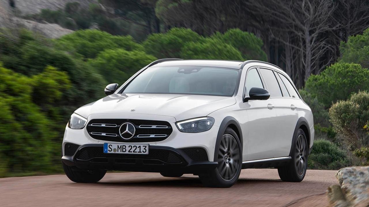 White Mercedes-Benz parked in the countryside