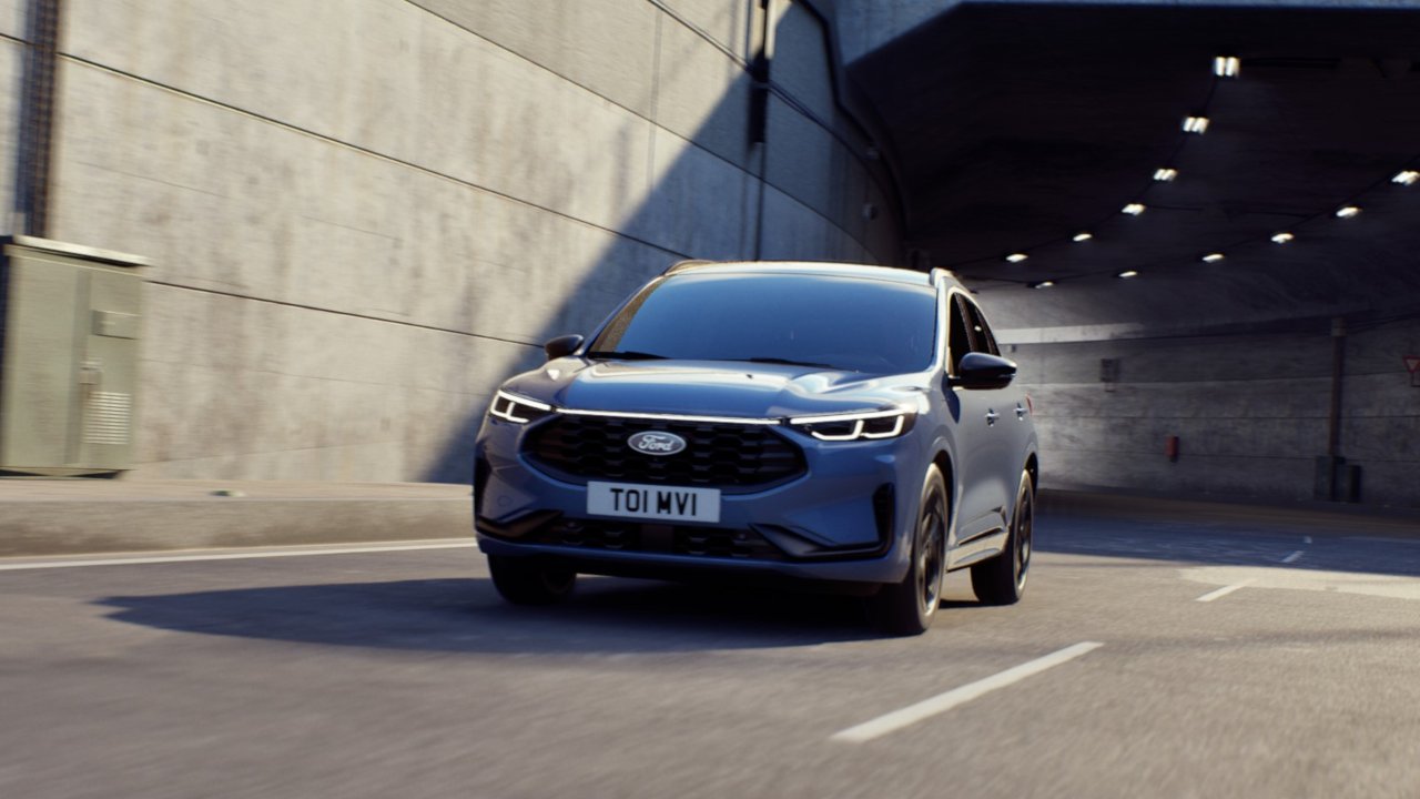 Ford Kuga driving through a modern urban tunnel setting