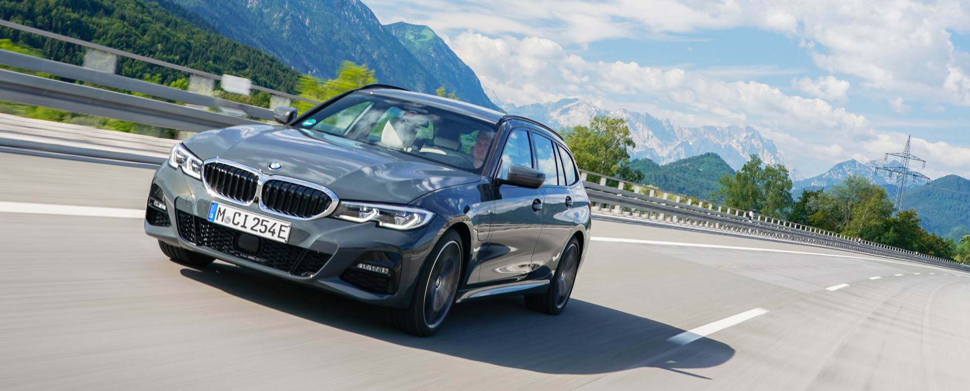 Grey BMW 3 Series Touring Exterior Front Driving