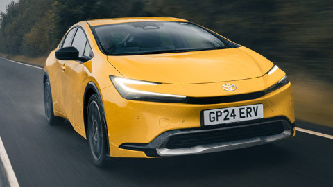 Toyota Prius in Yellow Driving