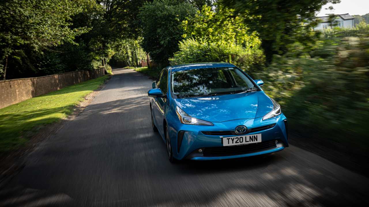 Blue Toyota Prius Exterior Front Driving