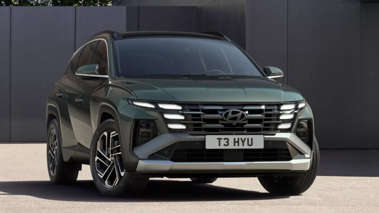 Hyundai TCUSON parked in front of a dark grey wall